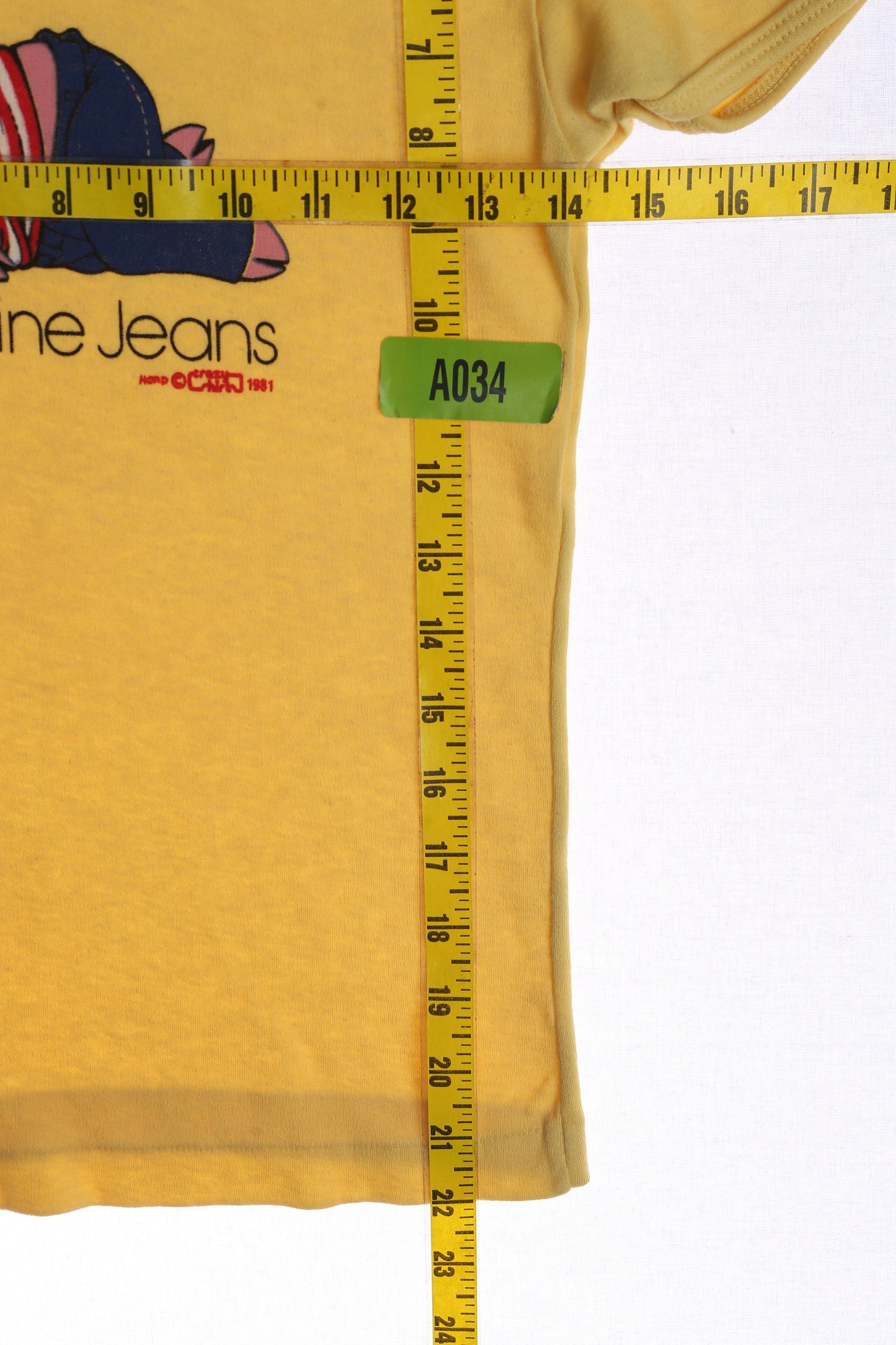 Vintage Women Yellow Graphic T-shirt - 1980s Calvin Swine Jeans by Crazy Shirt