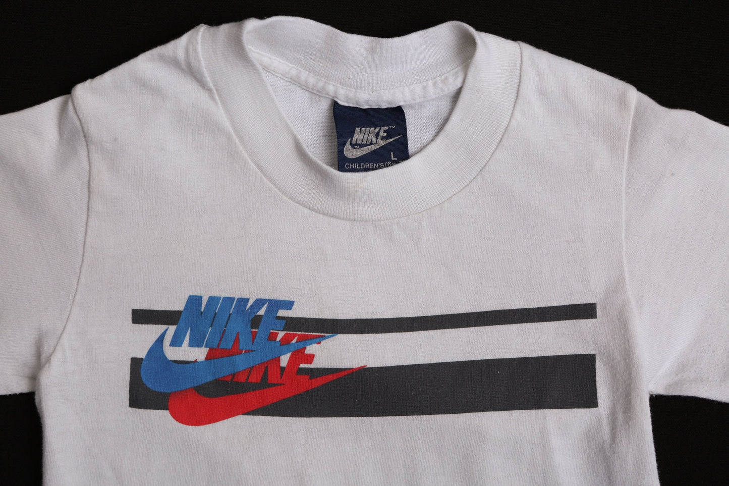Vintage Children Nike White Graphic T-shirt - Blue Label - Striped - Era 80's -90's