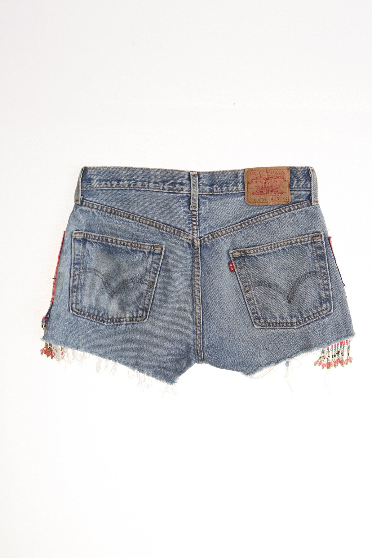 Vintage 501 levi's blue denim short high waist ethnic fringe native american beads embroidered