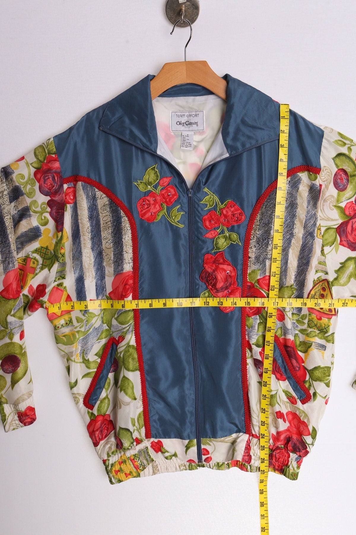 Vintage 90's silk bomber jacket floral print back writing oleg cassini team effort