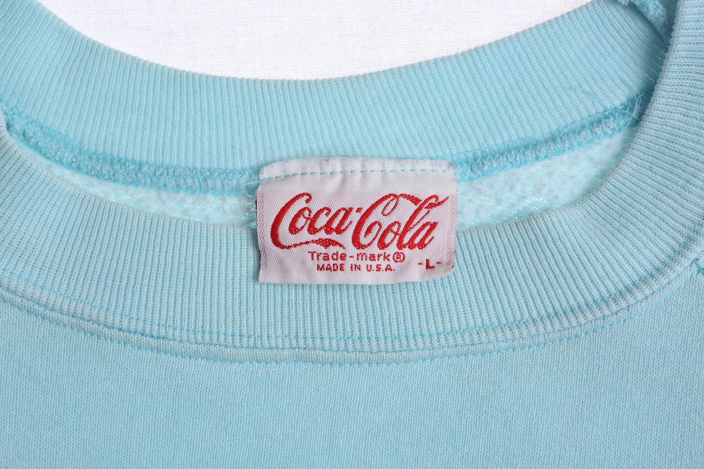 Vintage Coca Cola Blue Graphic Sweatshirt with Beach Surfing Print