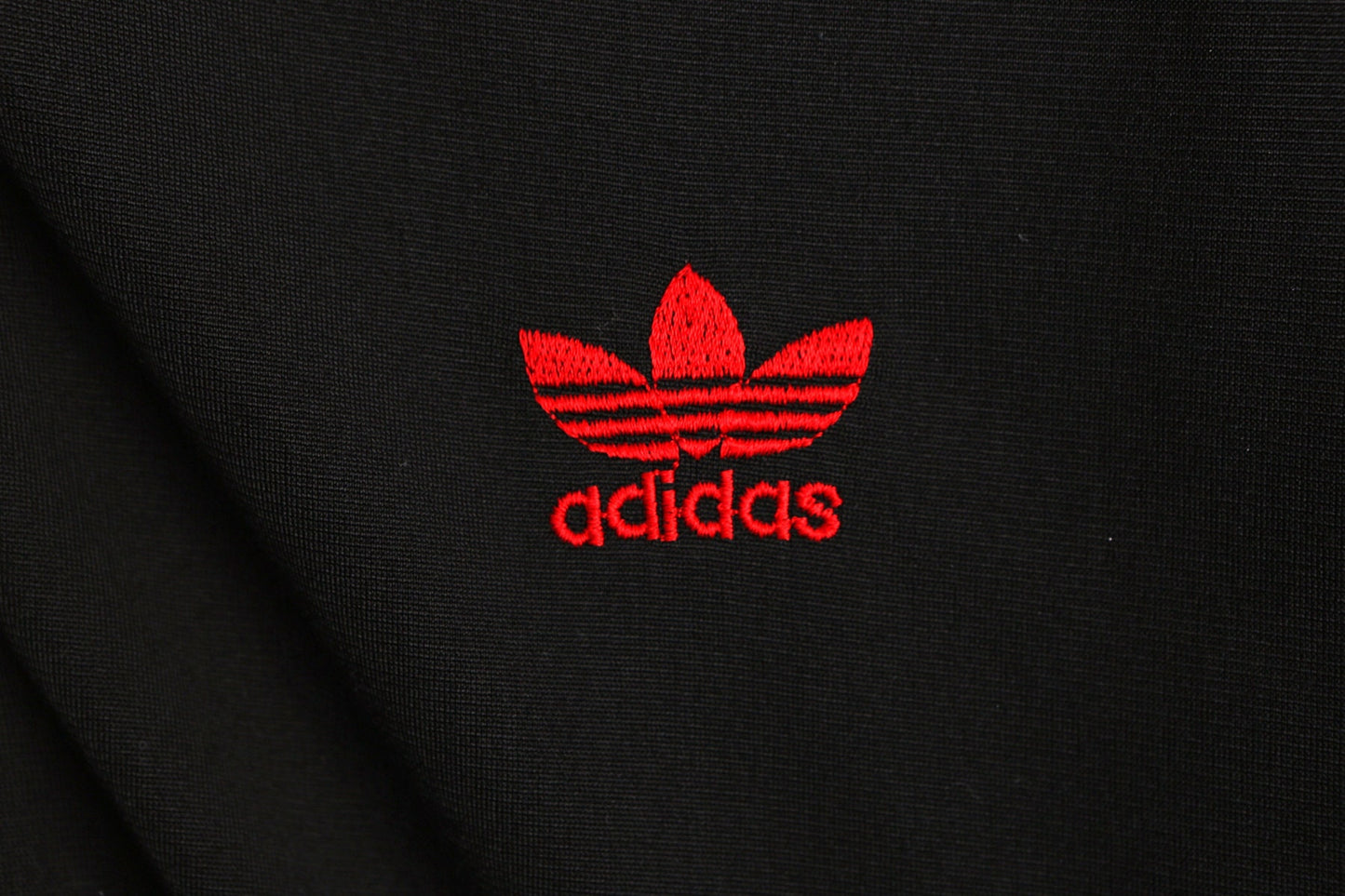 Vintage Adidas Black Jogging Top with Red Striped Sleeves