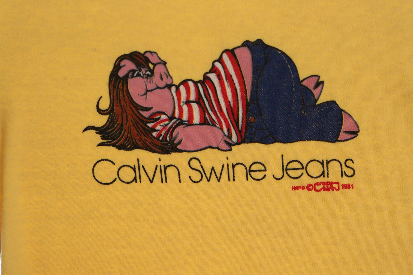 Vintage Women Yellow Graphic T-shirt - 1980s Calvin Swine Jeans by Crazy Shirt