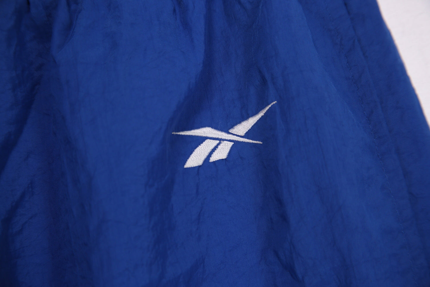 Vintage Blue Windbreaker Pants by Reebok - Estimated Era 1990's - Y2K